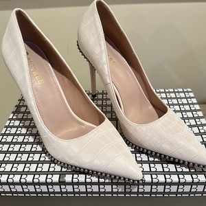 Ladies spike heel pumps